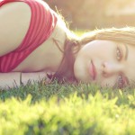 beautiful-girl-lying-in-the-grass-16664